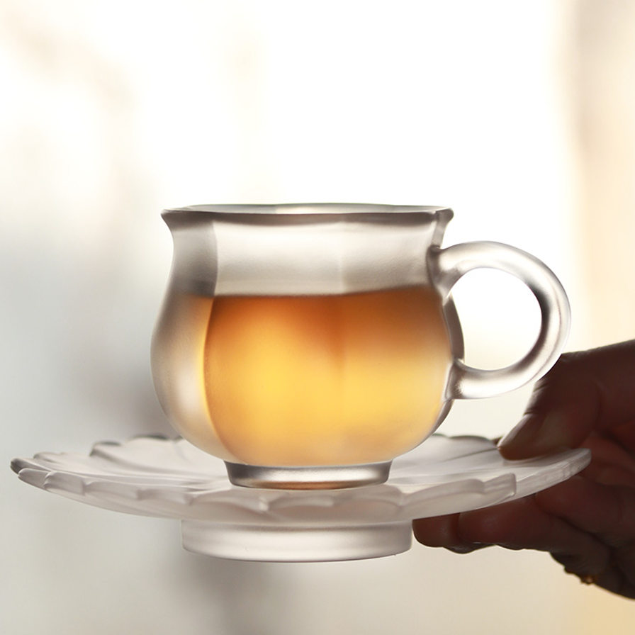Artisan-crafted glass teaware set in deep teal with a contemporary oriental design, perfect for creating a mindful and elegant tea ceremony experience.