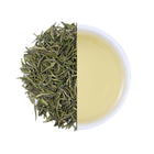 Premium Enshi Gongya Green Tea from Hubei, China, featuring delicate tea buds and fresh loose leaf green tea with a light golden infusion