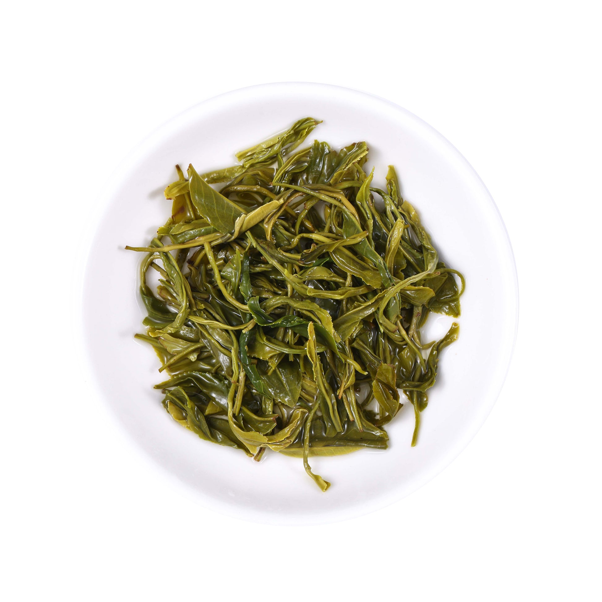 Enshi Selenium Rich Green Tea Grade 2 infused leaves from Hubei, China, featuring tender expanded green tea leaves with a fresh green color after brewing