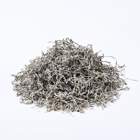Close-up of dried Teng Cha (Vine Tea) leaves showing the characteristic white frost coating, indicating high active botanical ingredients.