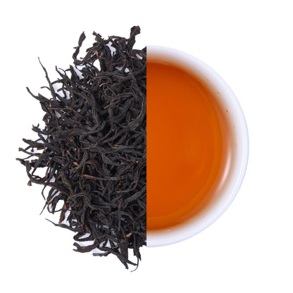 Premium Gaoshan Selenium Rich Black Tea from Hubei, China, featuring twisted loose leaf tea and a bright amber-red tea infusion with a rich aroma