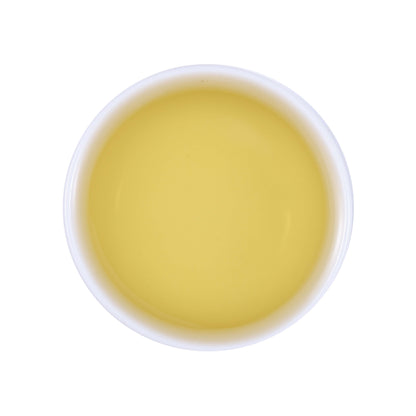 Laifeng Vine Tea Bud brewed tea soup showing a clear light yellow tea liquor with a fresh and delicate infusion from Enshi, Hubei, China