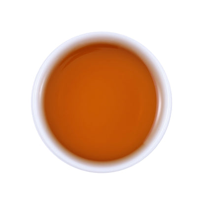 Laifeng vine tea large leaf brewed tea soup showing clear amber liquor color and natural herbal tea characteristics from Hubei, China
