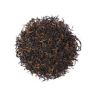 Premium Lichuan Gongfu Black Tea buds from Hubei, China, featuring fine golden tips and delicate twisted leaves with a rich aroma and creamy tea liquor quality