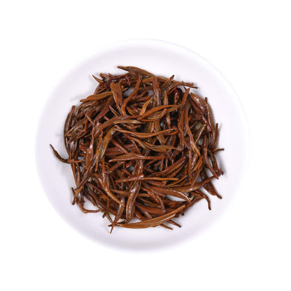 Lichuan Hong Black Tea infused leaves from the core production area of Hubei, China, featuring fully expanded reddish-brown leaves with rich aroma and traditional Chinese black tea character