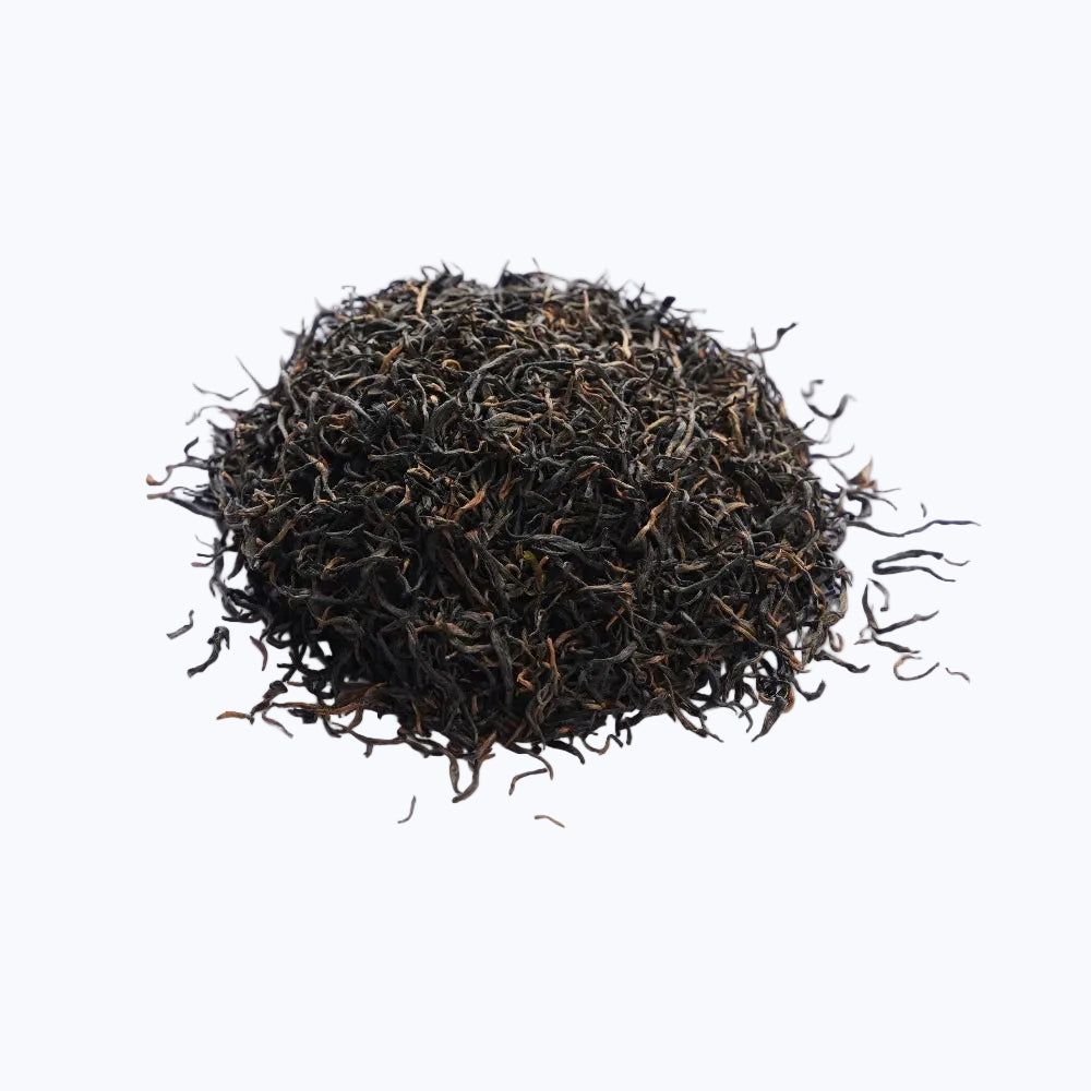 Loose leaf Jinjunmei black tea, a premium Chinese black tea with rich golden tips and curled leaves