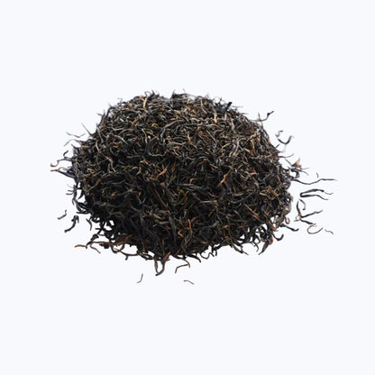 Loose leaf Jinjunmei black tea, a premium Chinese black tea with rich golden tips and curled leaves
