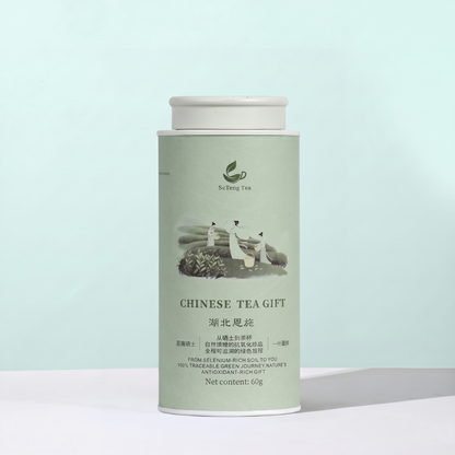 A light green canister of Teng Cha, offering a natural caffeine-free herbal infusion in safe, microplastic-free corn fiber bags.