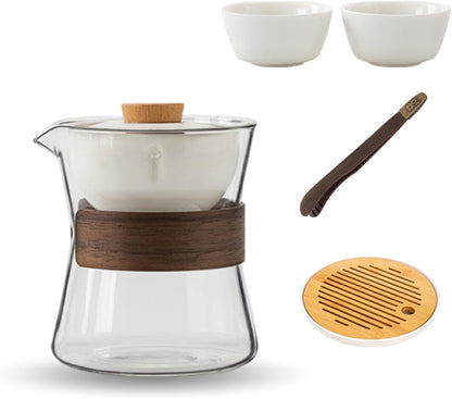 The ultimate modern Gongfu tea set, featuring a glass brewer, two tasting cups, traditional tongs, and a round slotted bamboo tray for a mess-free experience.