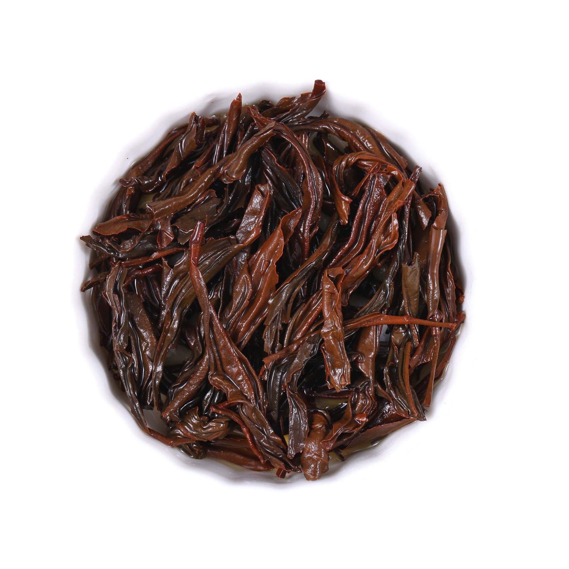 Wild black tea infused leaves from Hubei, China, featuring soft reddish-brown tea leaves with natural expansion and rich flavor characteristics