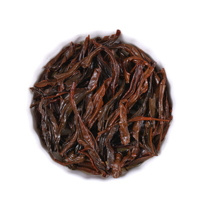 Wild black tea infused leaves from Hubei, China, featuring soft reddish-brown tea leaves with natural expansion and rich flavor characteristics