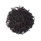 Premium wild-grown black tea from Hubei, China, featuring naturally twisted loose tea leaves with a deep color and rich traditional black tea character