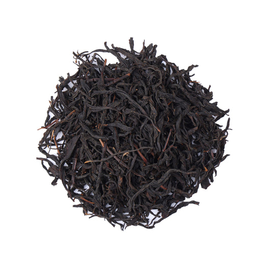 Premium wild-grown black tea from Hubei, China, featuring naturally twisted loose tea leaves with a deep color and rich traditional black tea character